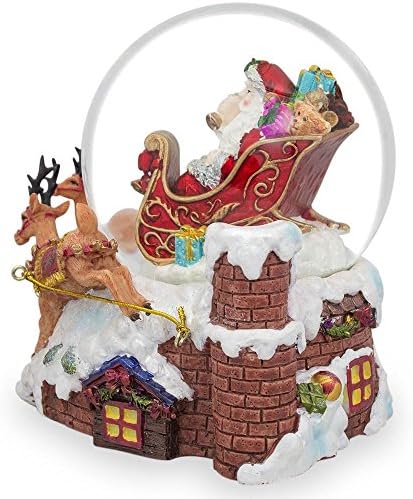 Дедо Мраз испорачува музички божиќен воден снег глобус