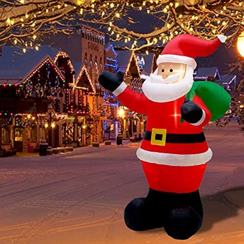 Остров слава 7 метри Божиќ надувување Дедо Мраз држејќи торба за подароци, разнесе Дедо Мраз со LED светла, осветлен Божиќен декор за дворови,