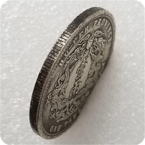 Кокрит копија Кинг династија на Кина Ху-Пех докажа дека се наоѓаат сувенири-монети со сувенири за монети со сребрена долар-реплика