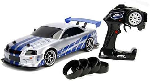 Играчки JADA Fast & Furious Brian's Nissan Skyline GT-R Drift Slide Slide RC радио далечински управувачки играчки тркачки тркачки автомобил со дополнителни гуми, 1:10 скала, сребро/сина боја