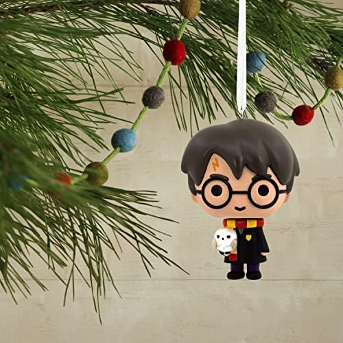 Белешка Хари Потер со Хедвиг кој го отскокнува Бади Божиќниот украс